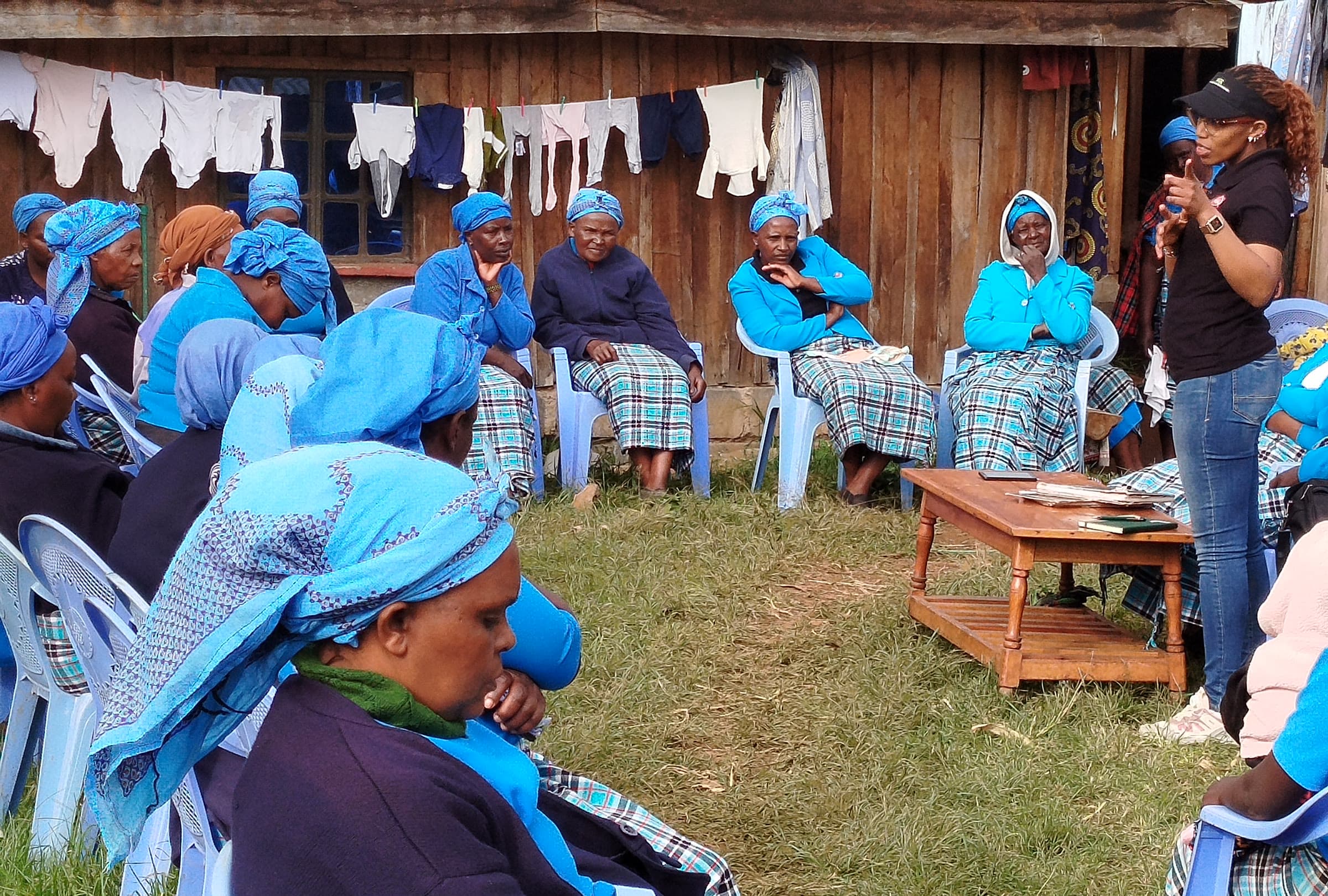 Greenleaf training a community group on biogas system use and maintenance